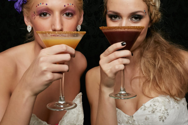two beautiful brides toasting